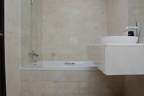 Comfy and Spacious 2BR The Masterpiece Epicentrum Apartment By Traveli