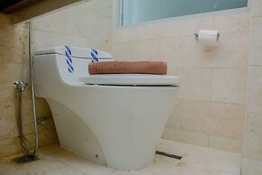 Comfy and Spacious 2BR The Masterpiece Epicentrum Apartment By Traveli