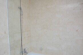 Comfy and Spacious 2BR The Masterpiece Epicentrum Apartment By Traveli