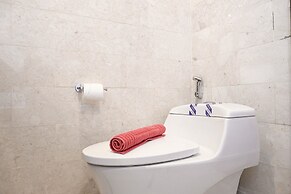 Comfortable Deluxe 2BR at The Empyreal Condominium Epicentrum Apartmen