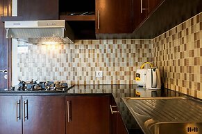 Comfortable Deluxe 2BR at The Empyreal Condominium Epicentrum Apartmen