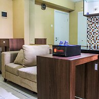 Comfortable and Tranquil 2BR Apartment at Green Pramuka By Travelio
