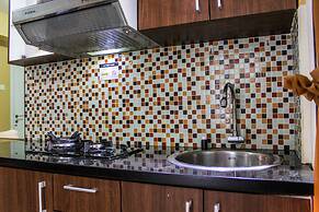 Comfortable and Tranquil 2BR Apartment at Green Pramuka By Travelio