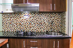 Comfortable and Tranquil 2BR Apartment at Green Pramuka By Travelio