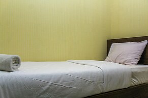 Comfortable and Tranquil 2BR Apartment at Green Pramuka By Travelio