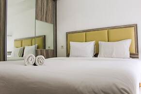 Relaxing 2BR Apartment at M-Town Residence By Travelio