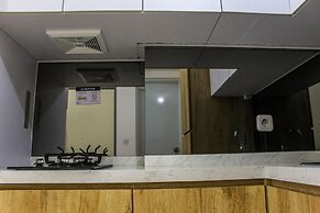 Relaxing 2BR Apartment at M-Town Residence By Travelio