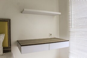 Relaxing 2BR Apartment at M-Town Residence By Travelio