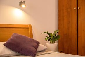 Terra Magica Deluxe Apartment OR Room with Private Parking, Terrace an