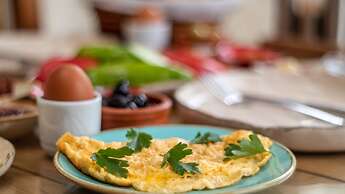 Avlu Alacati Butik Otel