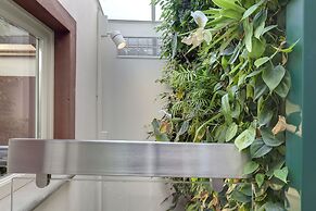 Vertical Garden Apartments by Mamo Florence