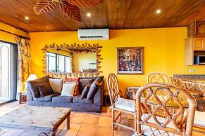 Warm Interiors and Orange Hues on Ground Floor in Front of Beach