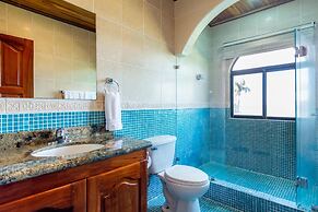 Warm Interiors and Orange Hues on Ground Floor in Front of Beach