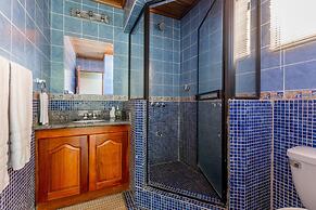 Warm Interiors and Orange Hues on Ground Floor in Front of Beach