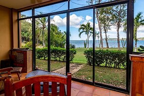 Warm Interiors and Orange Hues on Ground Floor in Front of Beach
