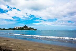 Warm Interiors and Orange Hues on Ground Floor in Front of Beach