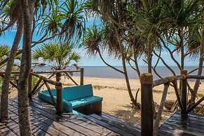 Saadani Safari Lodge - bush, river, beach