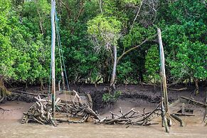 Saadani Safari Lodge - bush, river, beach