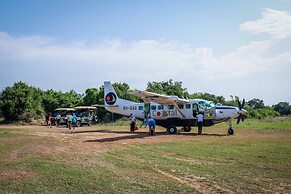 Saadani Safari Lodge - bush, river, beach