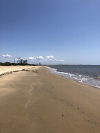 Saadani Safari Lodge - bush, river, beach