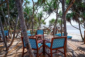 Saadani Safari Lodge - bush, river, beach