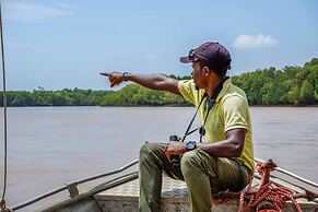 Saadani Safari Lodge - bush, river, beach