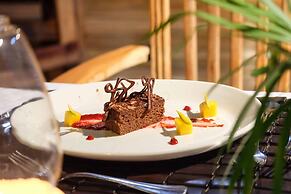 Saadani Safari Lodge - bush, river, beach