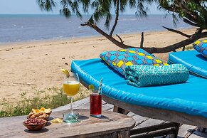 Saadani Safari Lodge - bush, river, beach