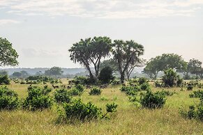 Saadani Safari Lodge - bush, river, beach