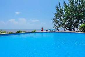 Saadani Safari Lodge - bush, river, beach