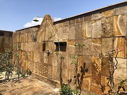 Saadani Safari Lodge - bush, river, beach