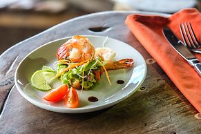 Saadani Safari Lodge - bush, river, beach