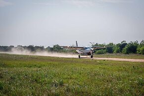 Saadani Safari Lodge - bush, river, beach