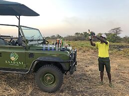 Saadani Safari Lodge - bush, river, beach