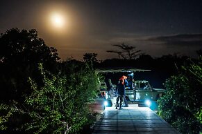 Saadani Safari Lodge - bush, river, beach