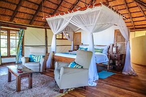 Saadani Safari Lodge - bush, river, beach