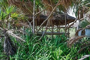 Saadani Safari Lodge - bush, river, beach