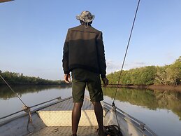 Saadani Safari Lodge - bush, river, beach