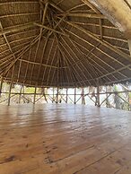 Saadani Safari Lodge - bush, river, beach