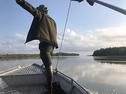Saadani Safari Lodge - bush, river, beach