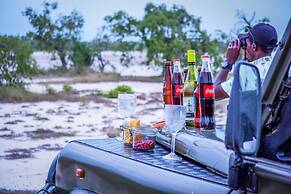 Saadani Safari Lodge - bush, river, beach