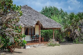 Saadani Safari Lodge - bush, river, beach