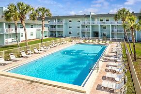 Ground Floor Pool Front Condo Sleeps 8 with easy beach access by RedAw