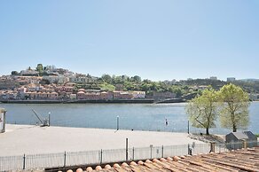 Miragaia Riverside Suites.