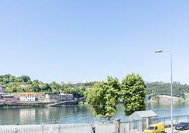 Miragaia Riverside Suites.