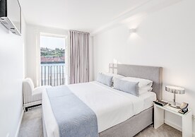 Miragaia Riverside Suites.