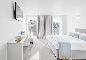 Miragaia Riverside Suites.