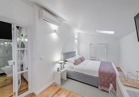 Miragaia Riverside Suites.