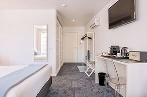 Miragaia Riverside Suites.