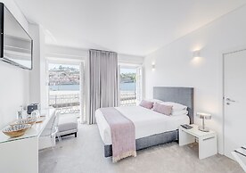 Miragaia Riverside Suites.